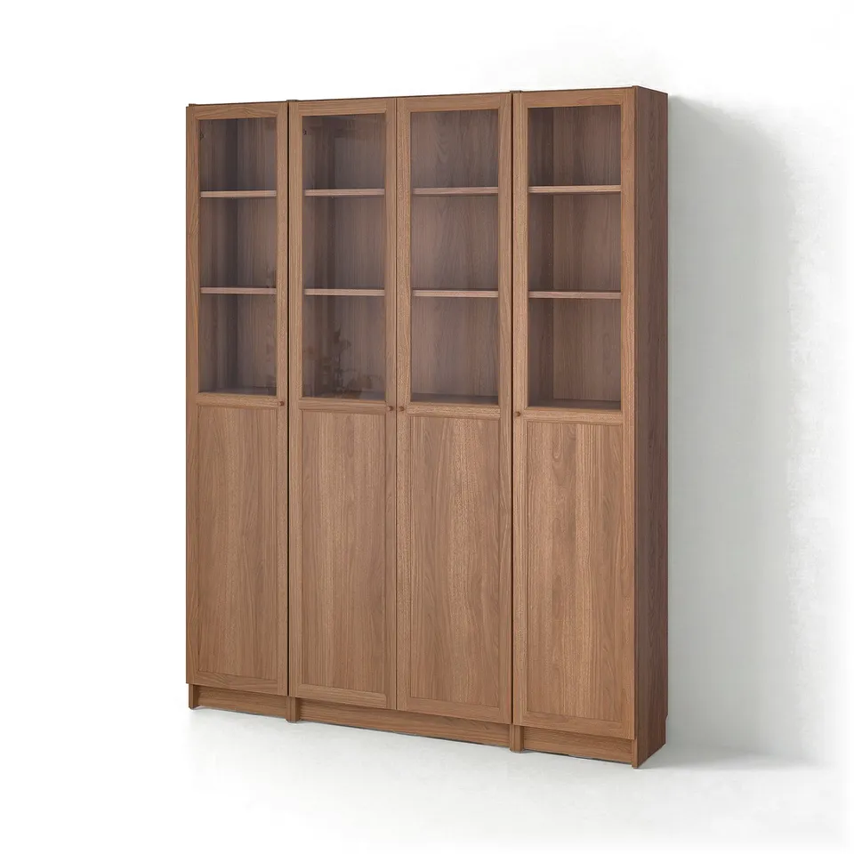Brown BILLY bookcase with panel/glass doors, wooden, rectangular, simple design.
