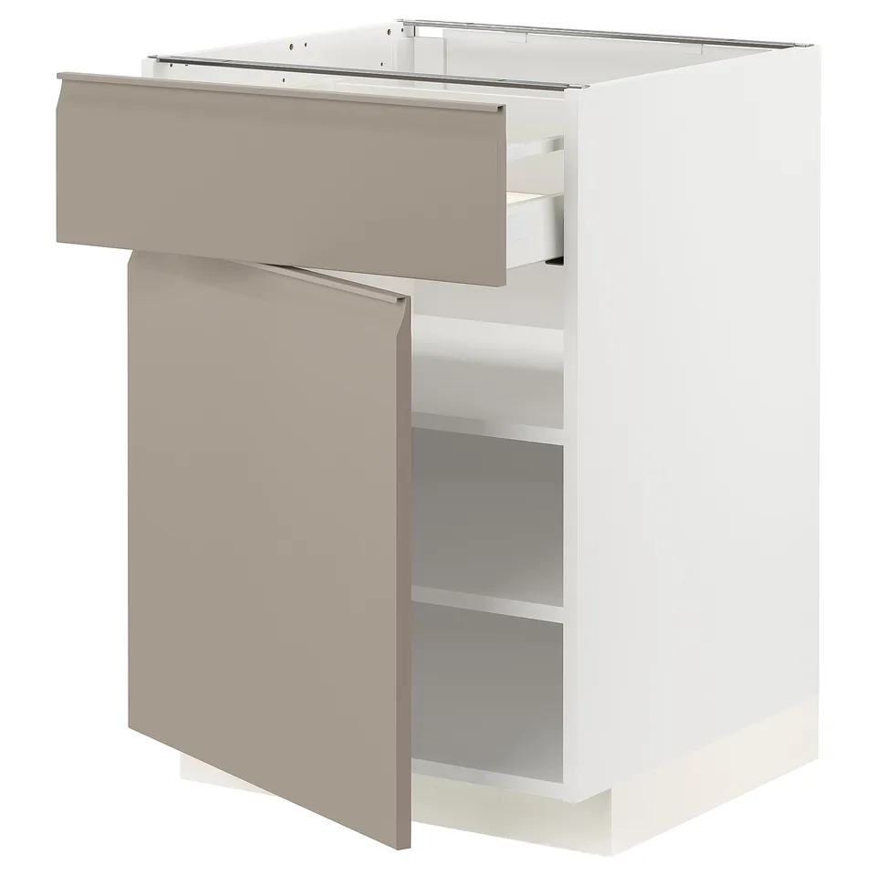 A white METOD kitchen cabinet with a beige drawer and door. It an integrated handle and sleek design.