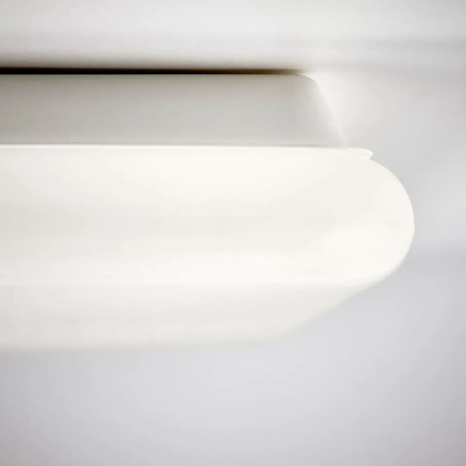 Sleek, minimalist led light panel, seamlessly designed, diffusing soft, adjustable light.