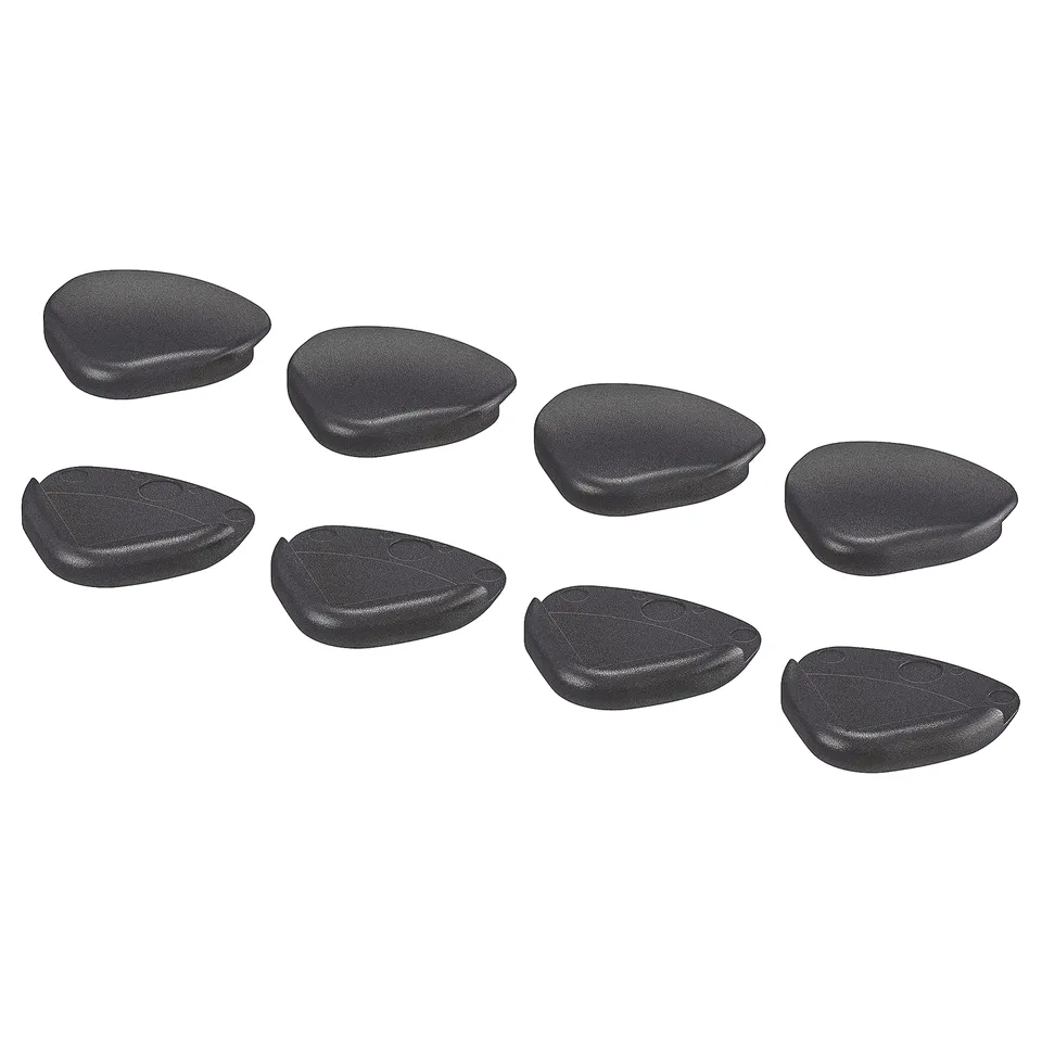 Eight black, teardrop-shaped corner bumpers, designed for child safety, arranged in a grid on a white background.