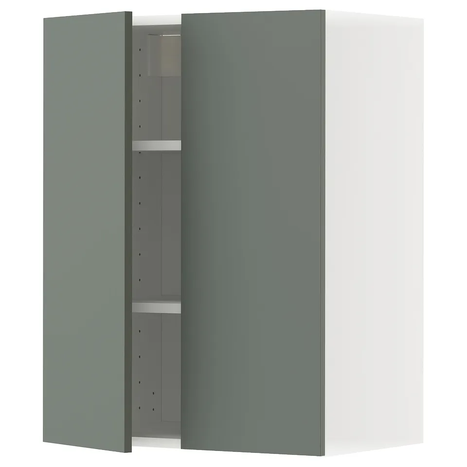 Green METOD wall cabinet with adjustable shelf and grey interior.
