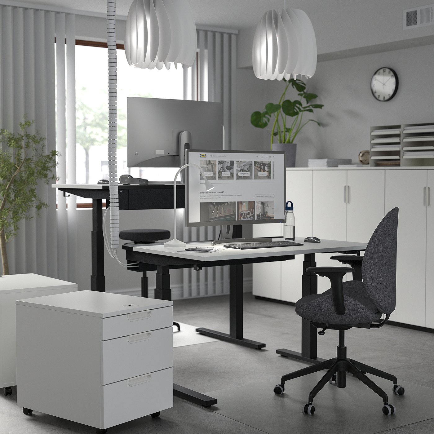 Modern home office: MITTZON white desk, ergonomic chair, dual monitors, minimalist design.
