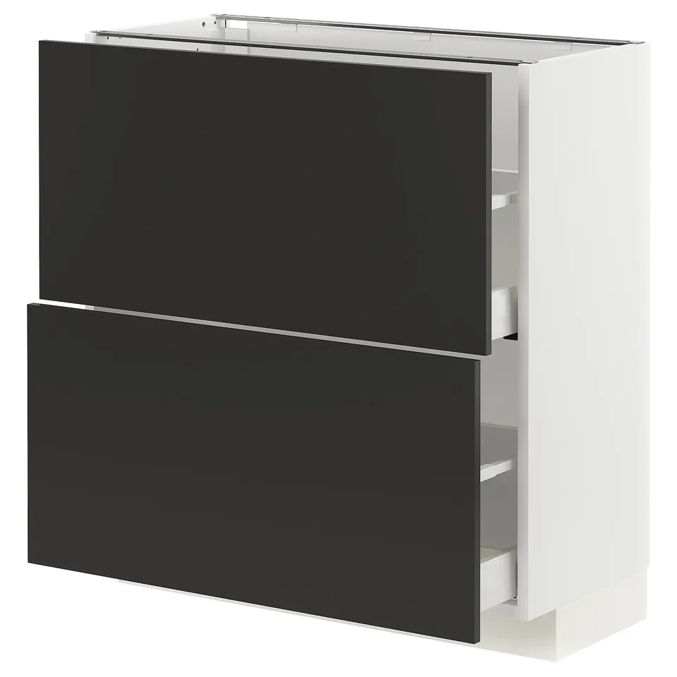 Black and white cabinet with drawers, modern design, metallic handles.