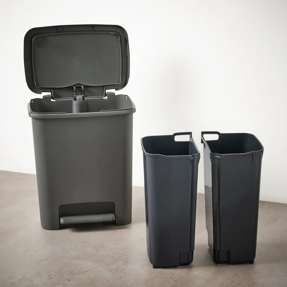 Waste sorting bins: step-on & divided for kitchen efficiency.