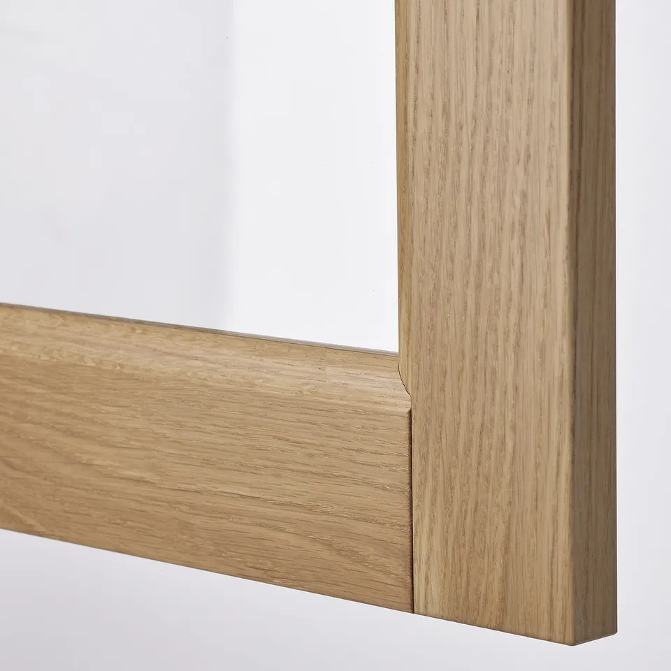 Close-up of wooden frames corner, showcasing smooth finish and sturdy craftsmanship.