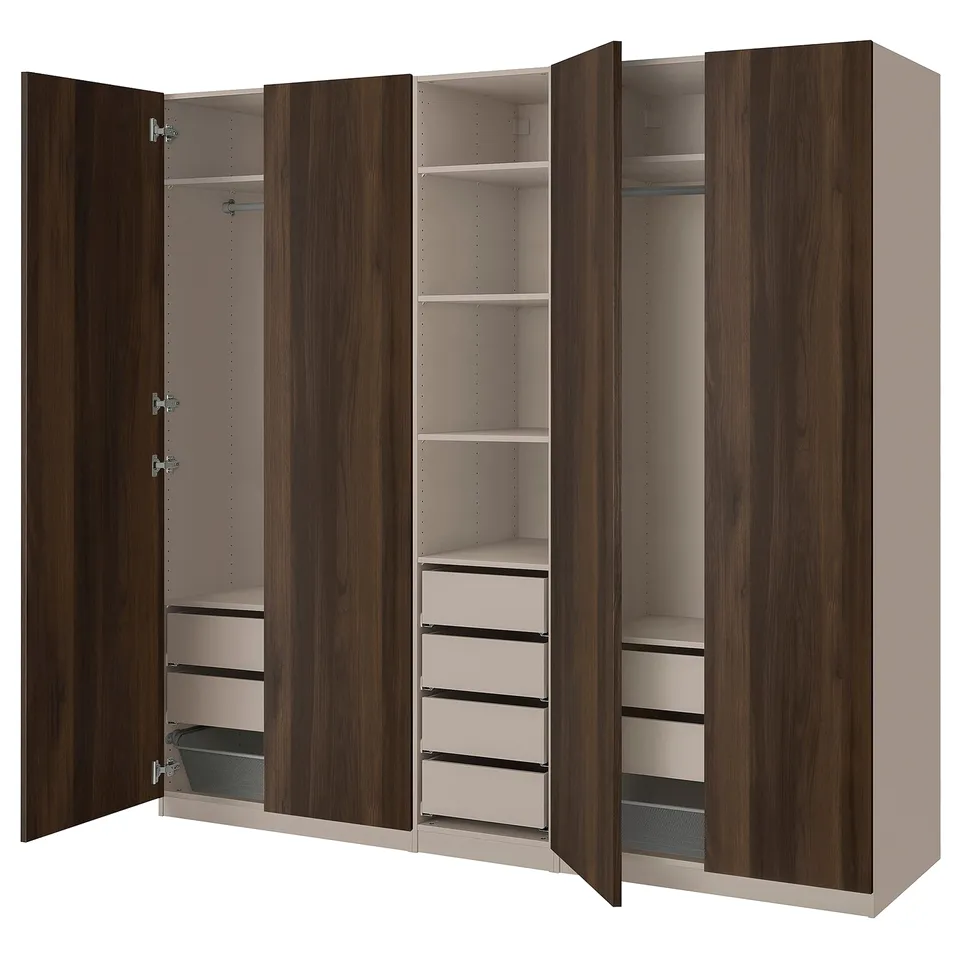 An open PAX wardrobe in brown. It has shelves, drawers, and a mesh basket inside.