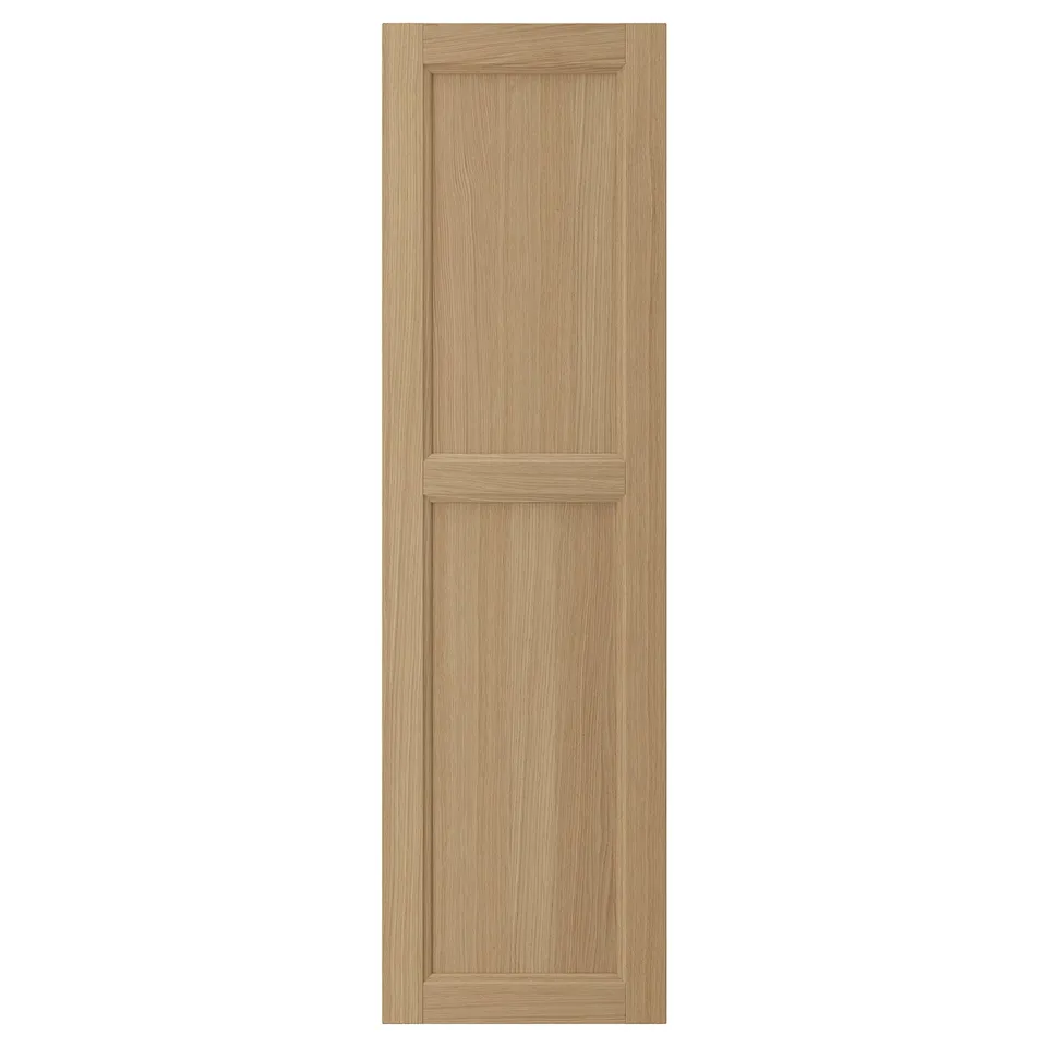 VEDHAMN natural wood kitchen door, rectangular shape, solid oak frame, oak veneer panels, warm tone.