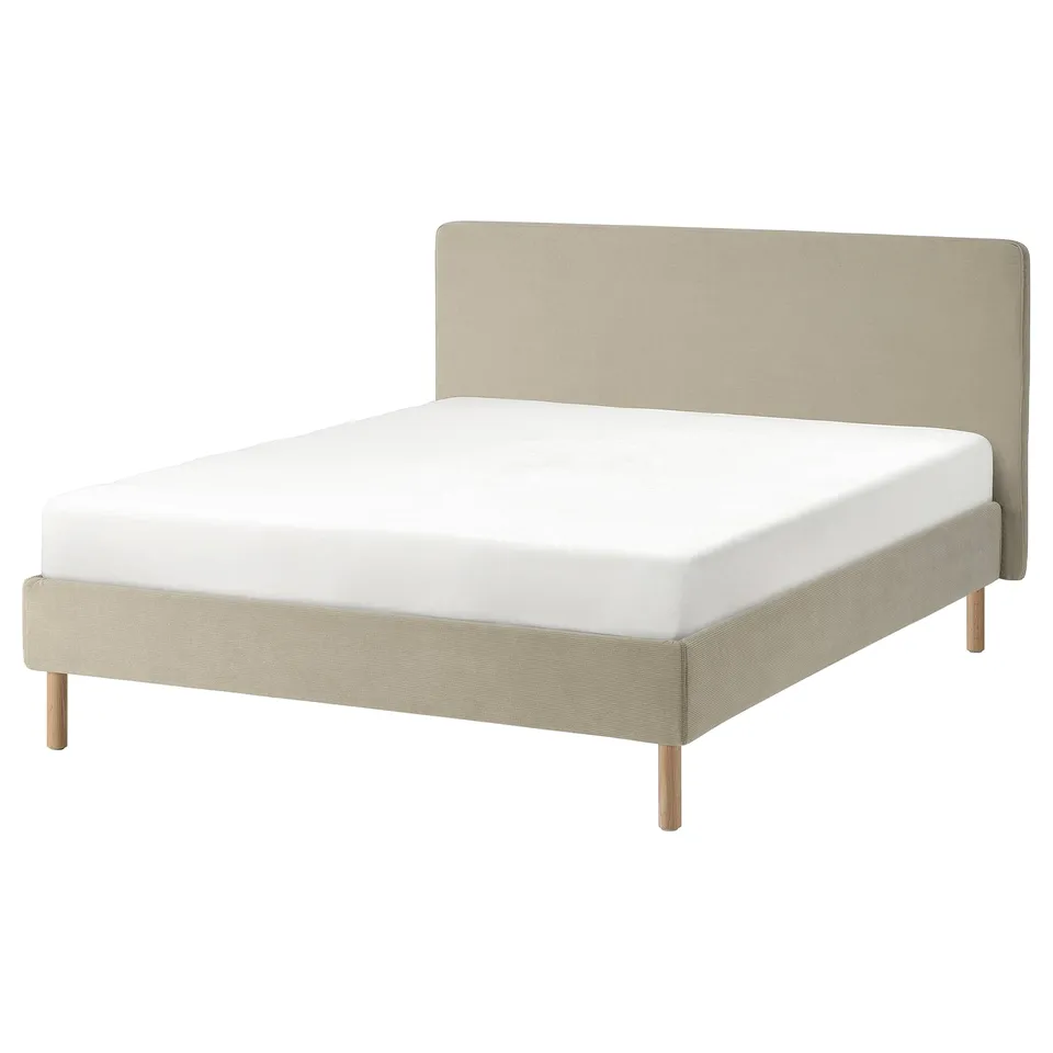 Minimalist bed: beige, fabric-covered, two-tone legs, clean design.