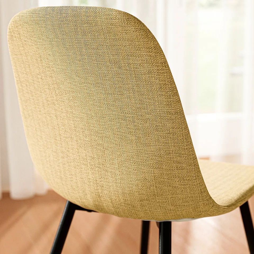 Modern chair with sleek design, comfortable cushioning. Black metal legs support beige fabric seat and back.