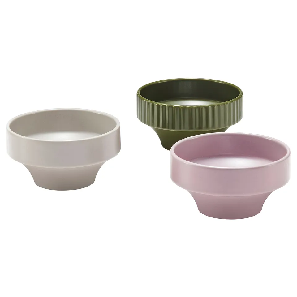 Beige, green, pink glazed stoneware bowls, narrow to wide rims, triangular arrangement.