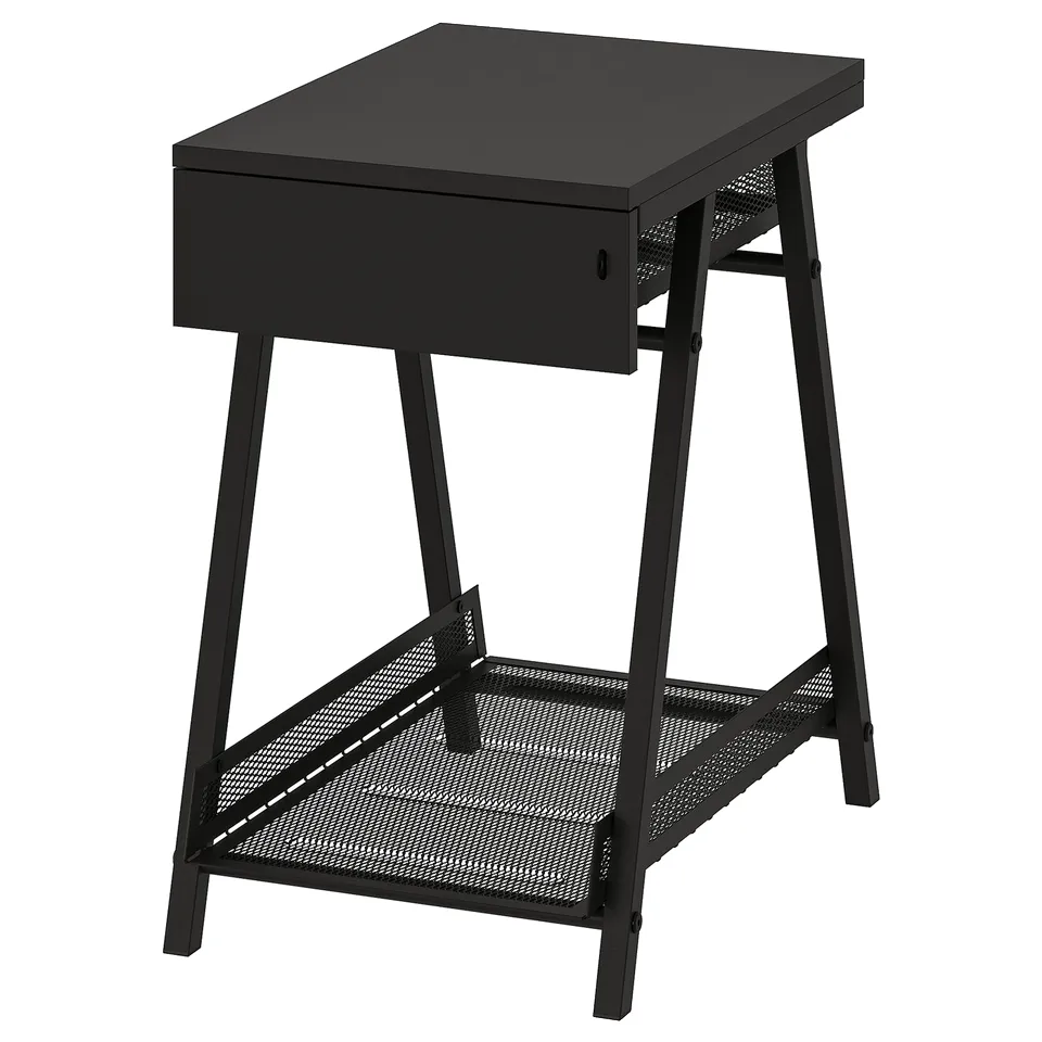 A black TROTTEN storage table with a drawer and perforated metal shelves.
