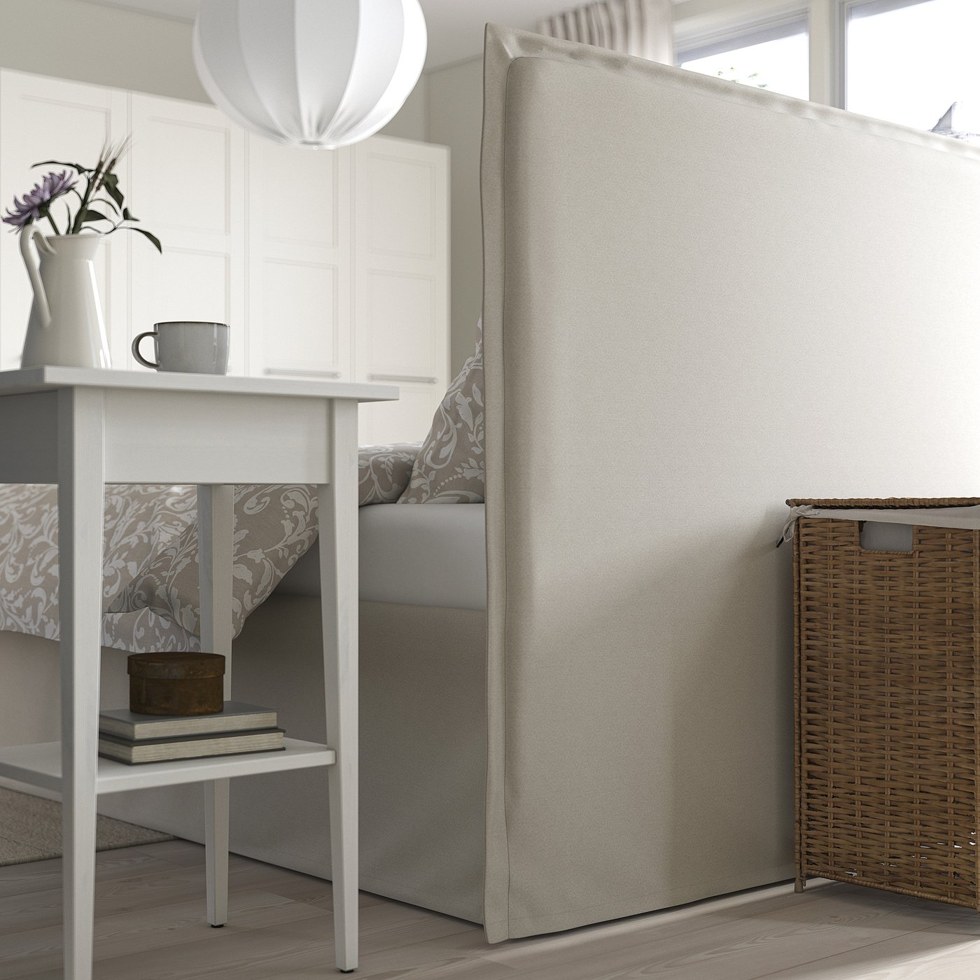 Cosy bed with padded headboard, removable cover, under-bed storage.