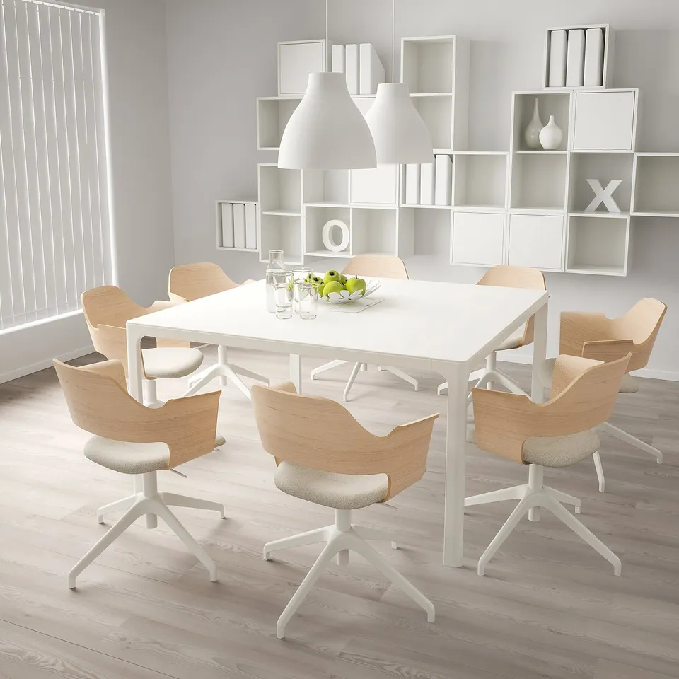 FJÄLLBERGET adjustable white chair. Light wood, high back, swivel design. Large, modern dining setup.