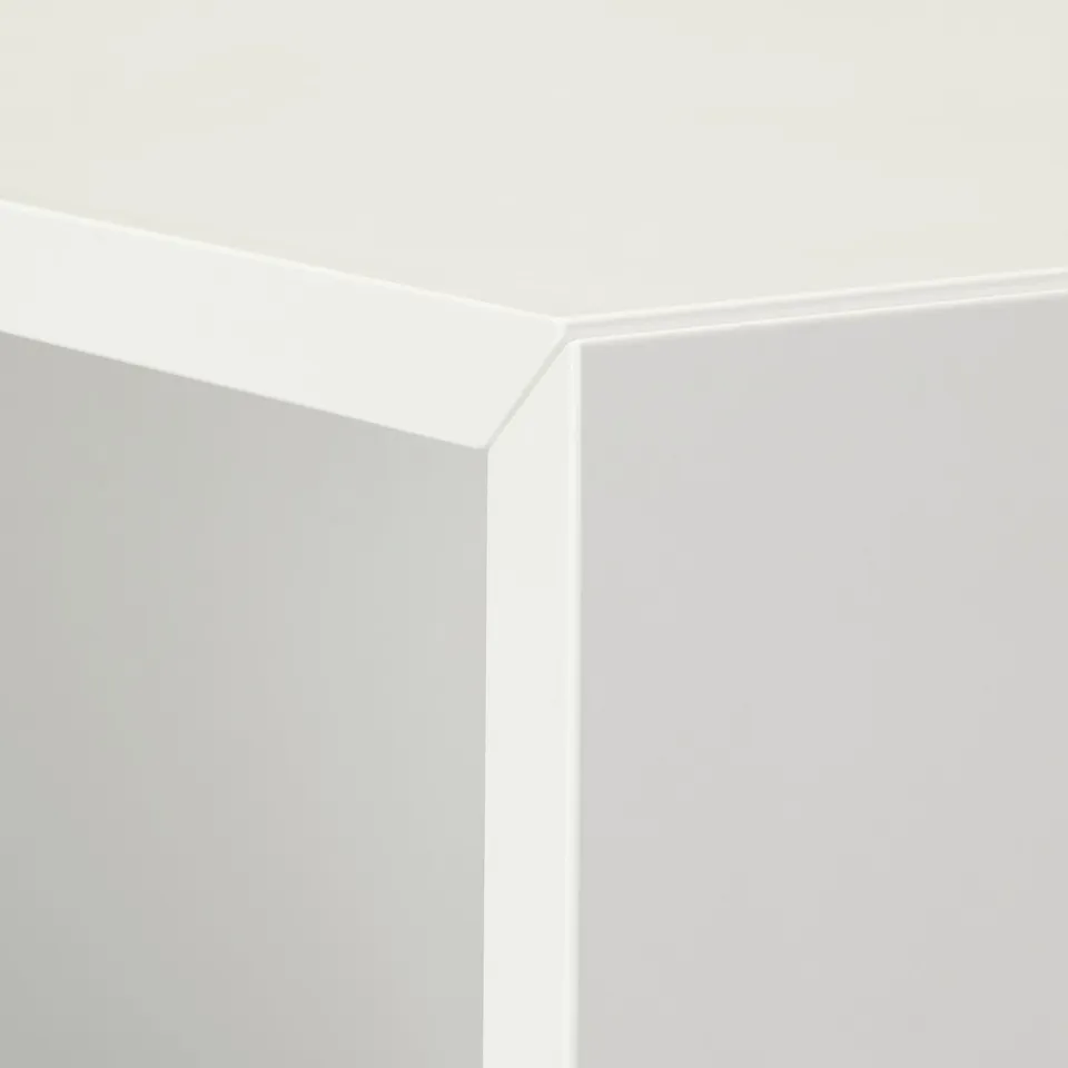 Clean, white, modern cabinet corner, showcasing sleek design and quality finish.