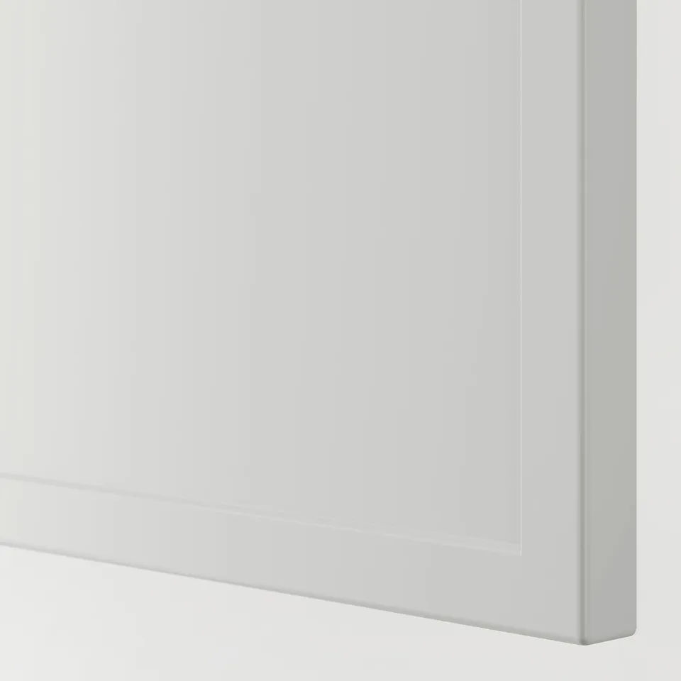 Close-up of ASPUDDEN cover panels sleek, thin white frame. Smooth surface, quality finish.
