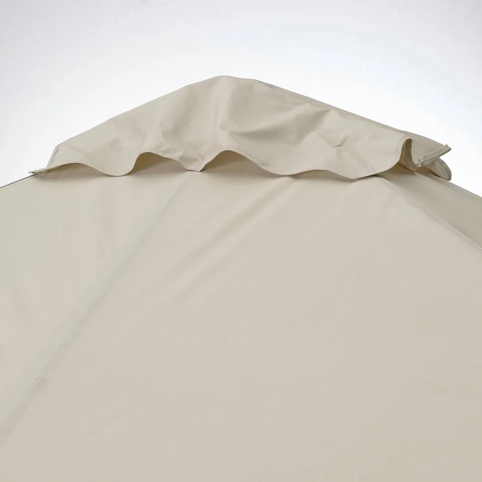 Beige fabric canopy with scalloped edge, likely part of a gazebo, displaying smooth, taut material against a light sky.