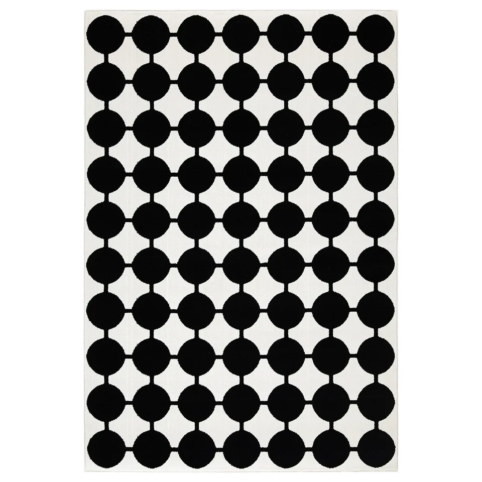Black and white dot pattern rug, rectangular shape, playful design by ingela håkansson.