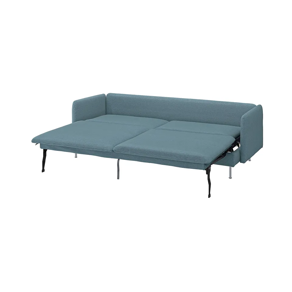 Blue convertible sofa-bed with sleek design, deep cushions, high legs, and elastic weave for comfort.