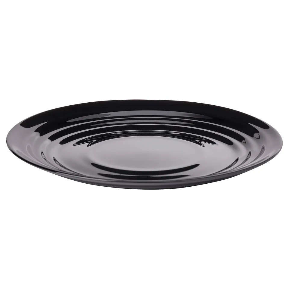 Black, circular, glossy dinner plate with wavy ripple design.