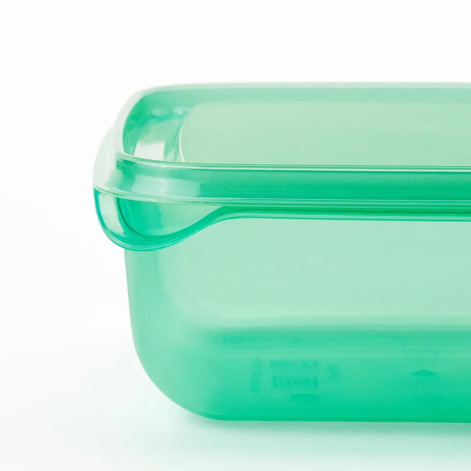 Green rectangular food container with secure, transparent lid and durable plastic.
