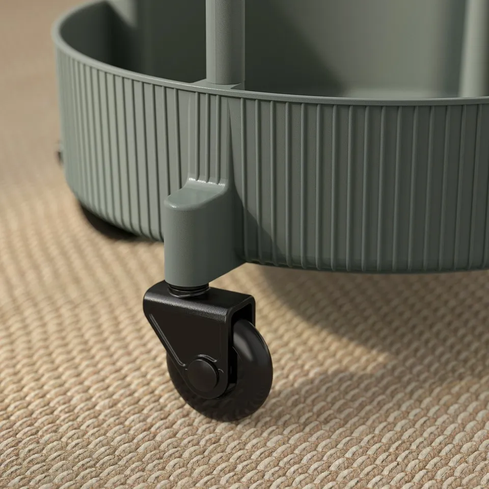 Close-up of modern, green, 3-tier trolley with smooth wheels, showcasing sturdy design and quality materials.