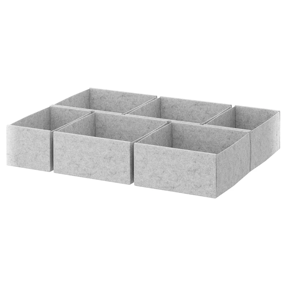 Four KOMPLEMENT drawer organisers, light grey, rectangular, made from 100% polyester felt.