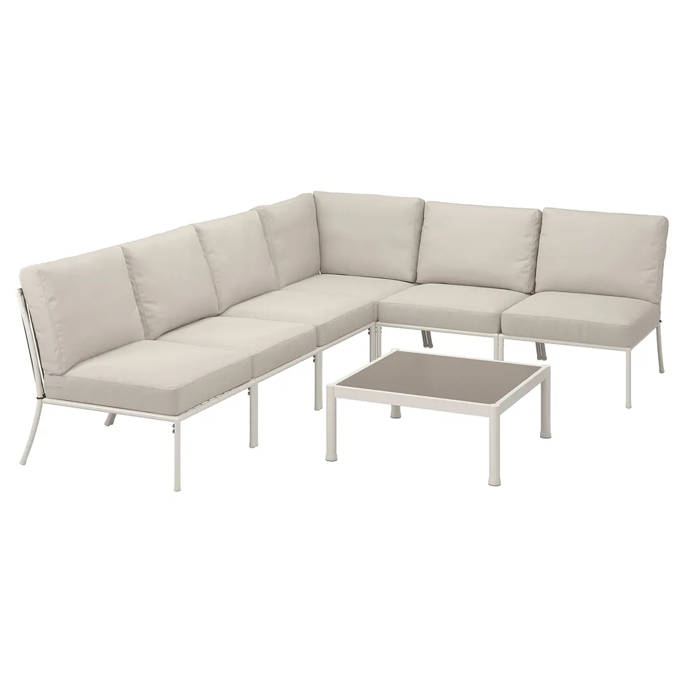 Modern outdoor sectional in light beige, featuring steel frames and plush cushions, designed for comfort and style.