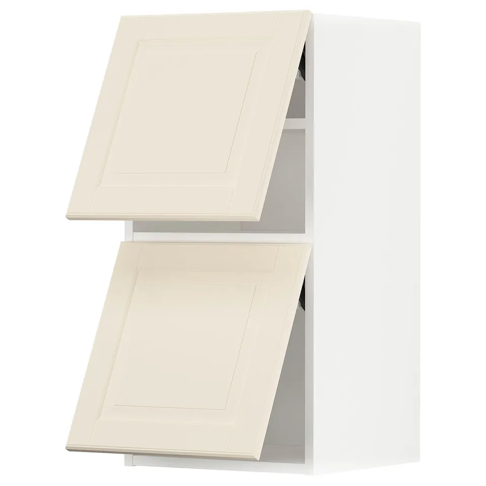Two white off-white bevelled cabinet doors, open.