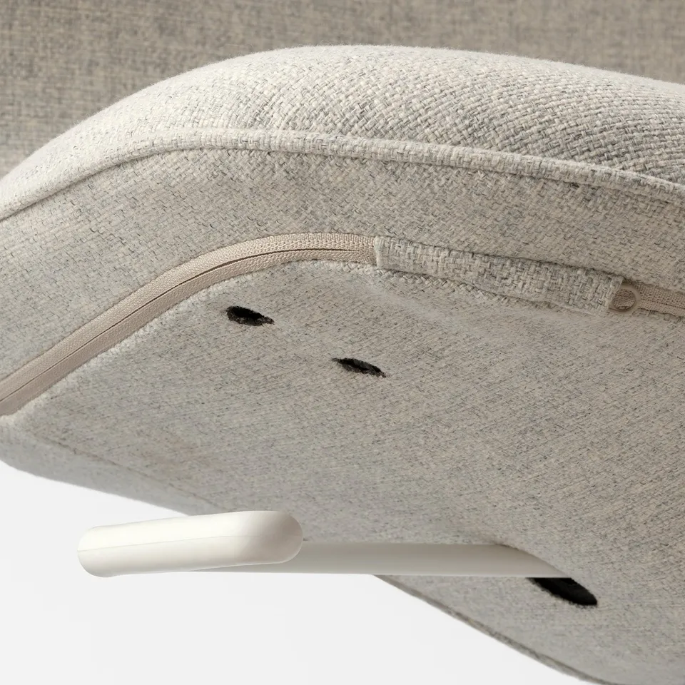 Close-up of a high-quality fabric office chair with visible stitching and sleek design.