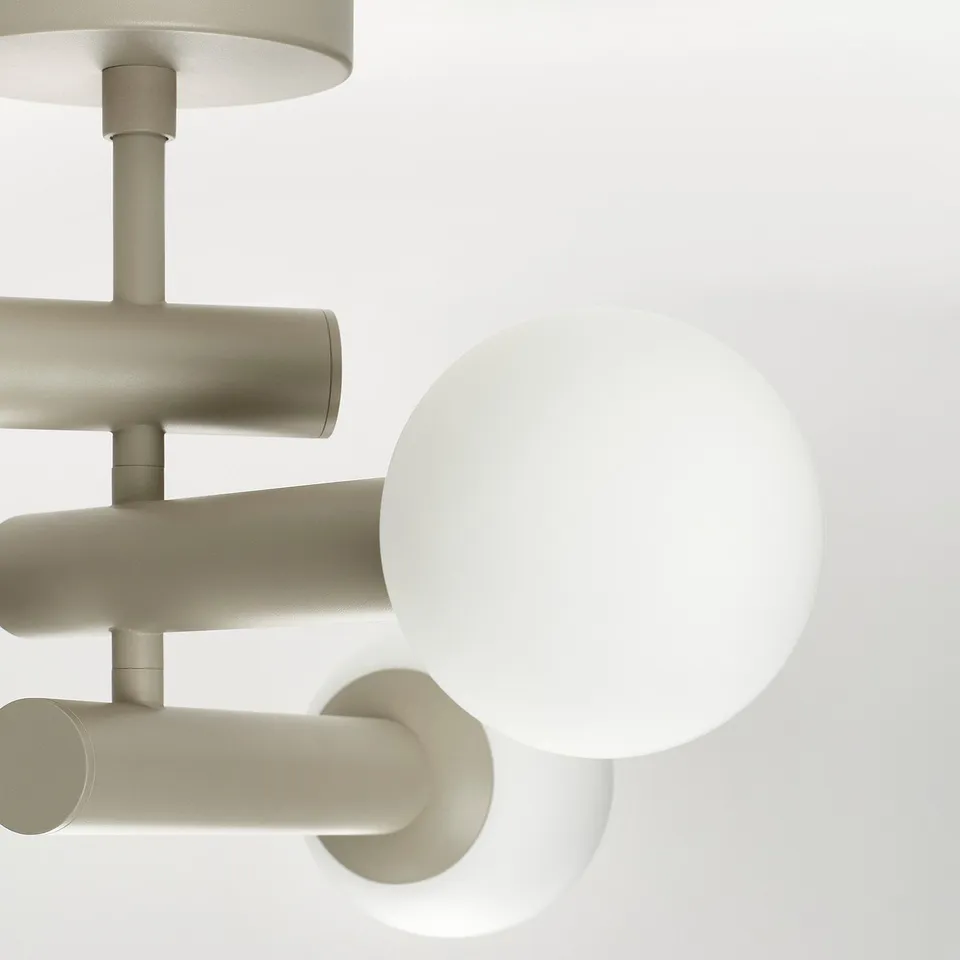 Modern ceiling lamp with sleek metal arms and frosted glass shades, designed for stylish, glare-free lighting.