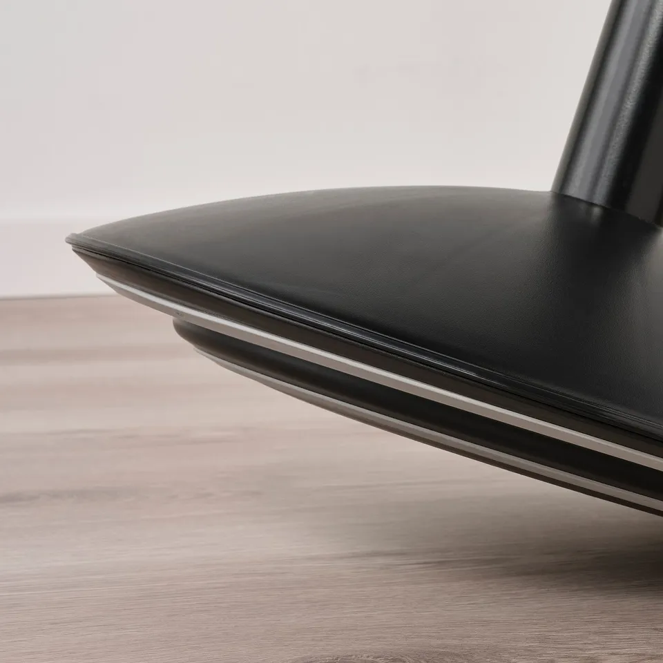 Blackoffice chair with adjustable height, padded seat, and curved base for posture support.
