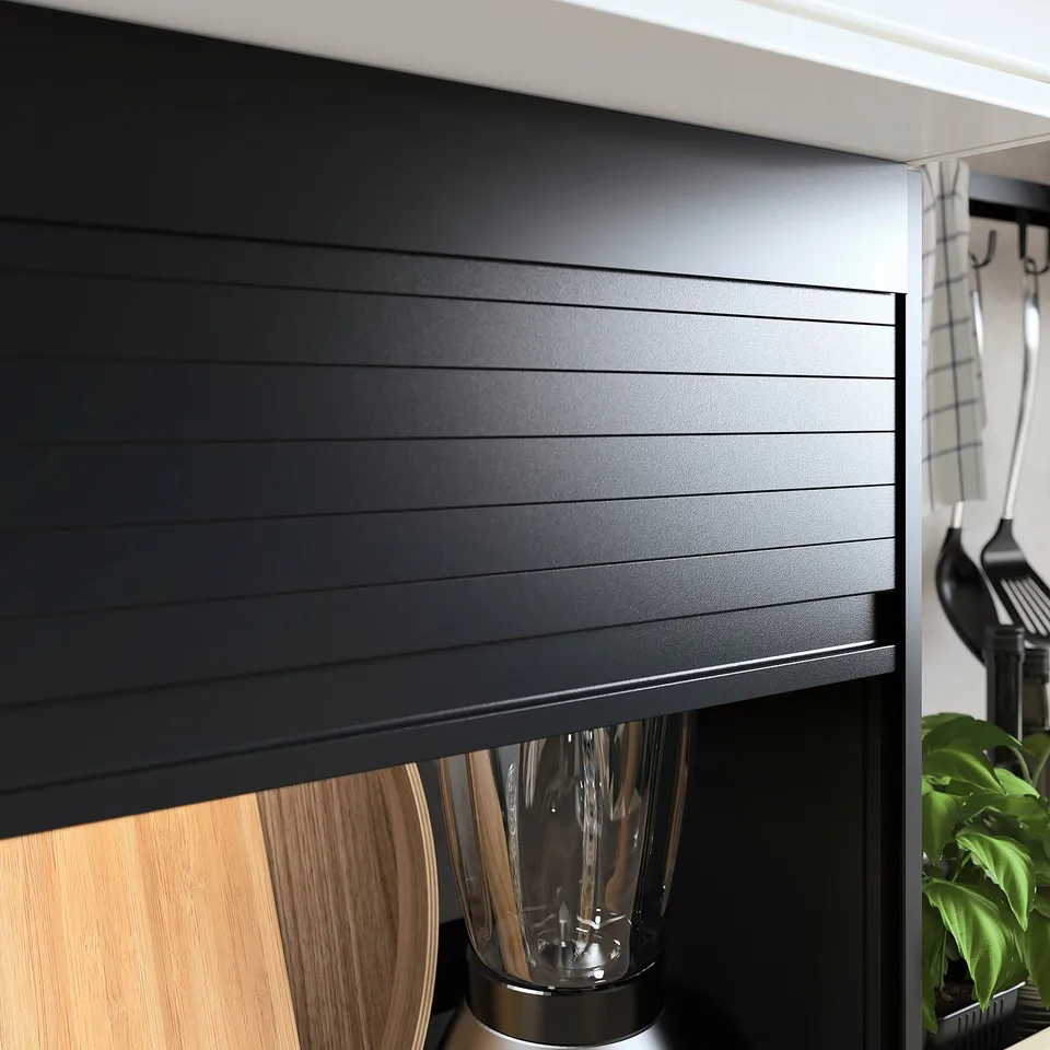 Black kitchen cabinet with horizontal lines, wooden countertop, and stainless appliance, modern design.
