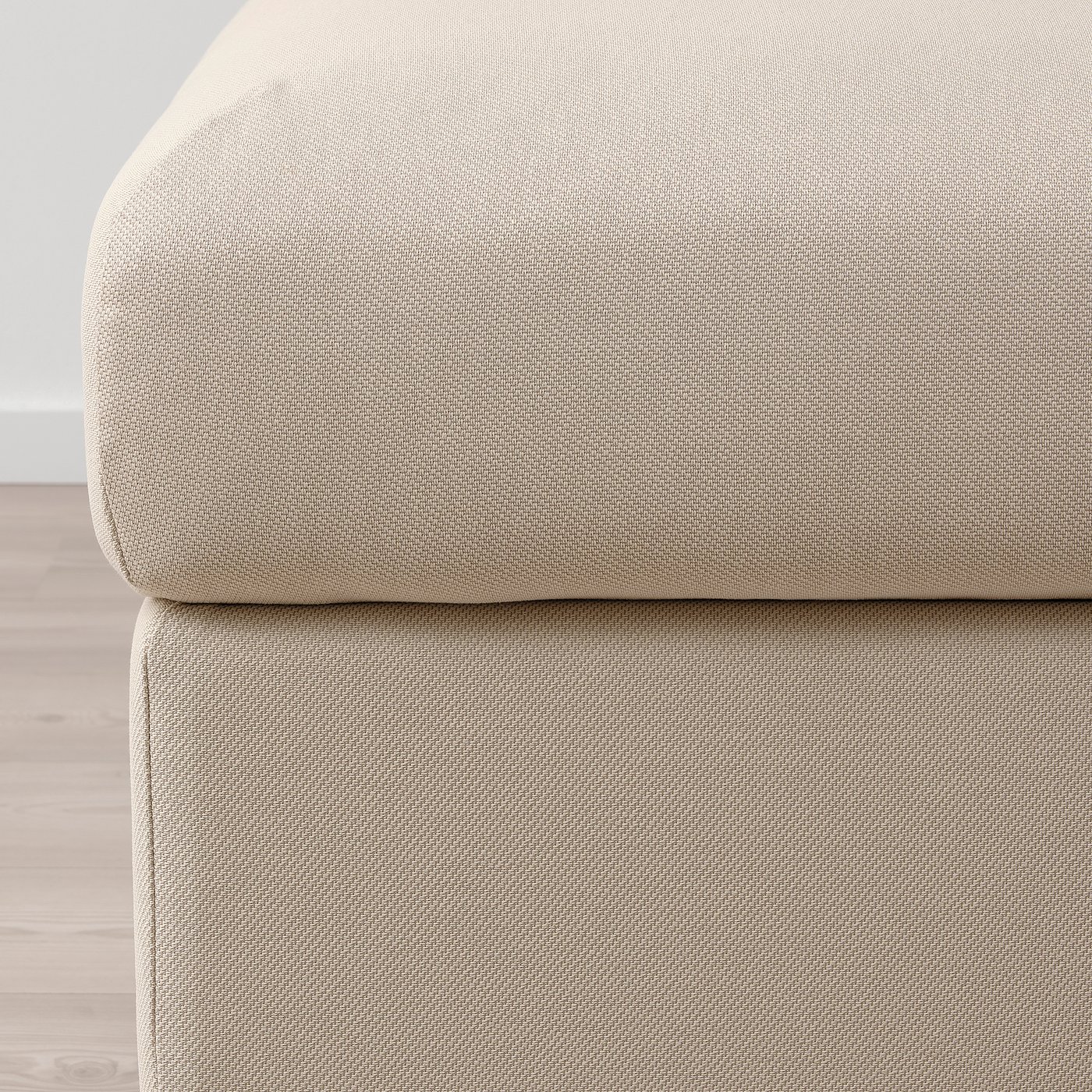 Close-up of VIMLE footstools plush, beige fabric. Soft texture, clean design.