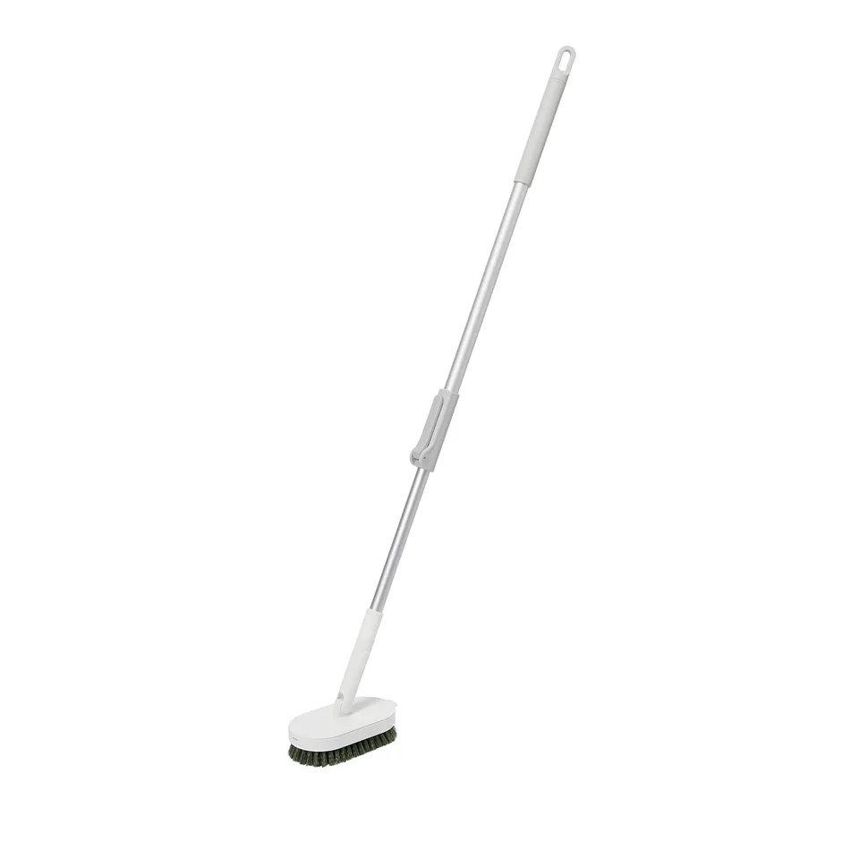 A long-handled cleaning brush with green bristles for scrubbing, designed to attach to a telescopic handle for extended reach.