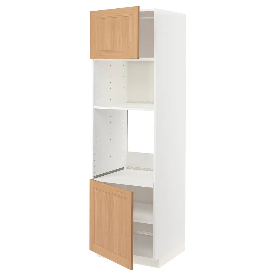 A white METOD kitchen cabinet with oak doors, one open, revealing shelves.