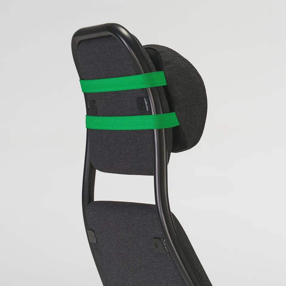 High-quality office chair backrest with green elastic bands, demonstrating sturdy support and comfort.