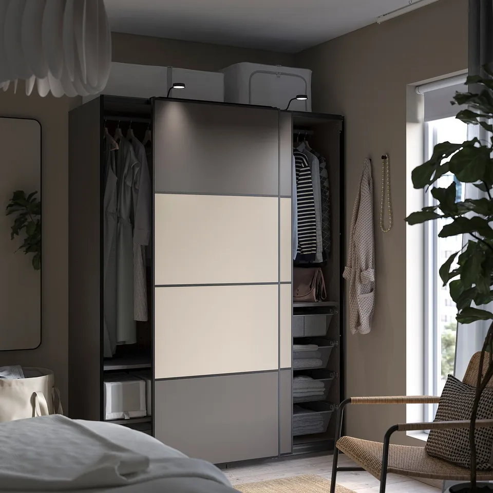 Bedroom with PAX wardrobe, white and grey, modern design, hanging clothes, shelves.