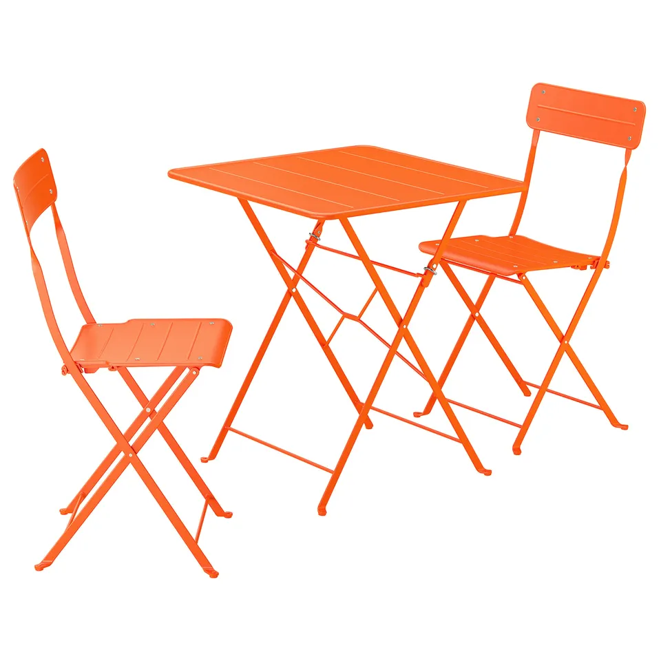 Bright orange outdoor table and chairs set, foldable, made of metal, modern design, perfect for small spaces.