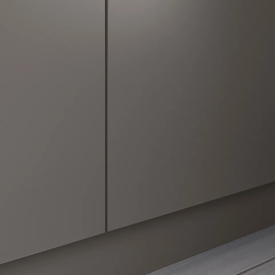 Modern black minimalist cabinet close-up. Smooth matte finish, clean design, straight edges.