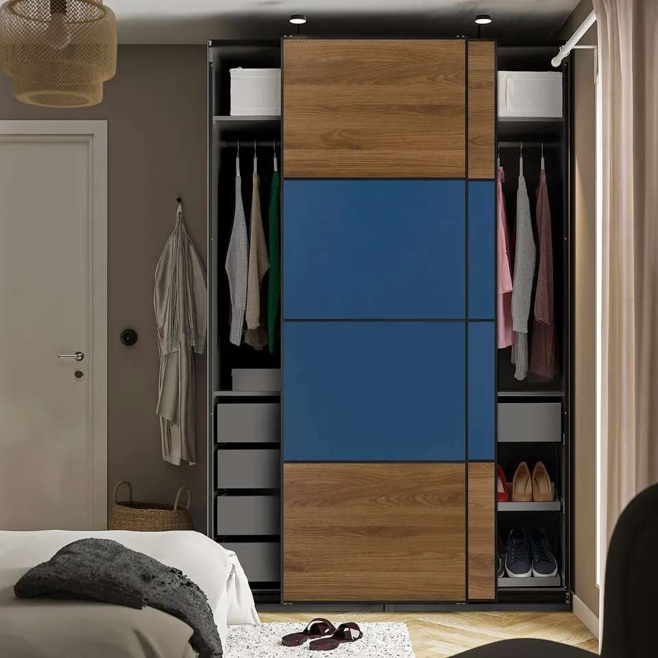 A PAX wardrobe with sliding doors, organising clothes and shoes in sections, integrate adjustable lighting, and soft-close mechanism.