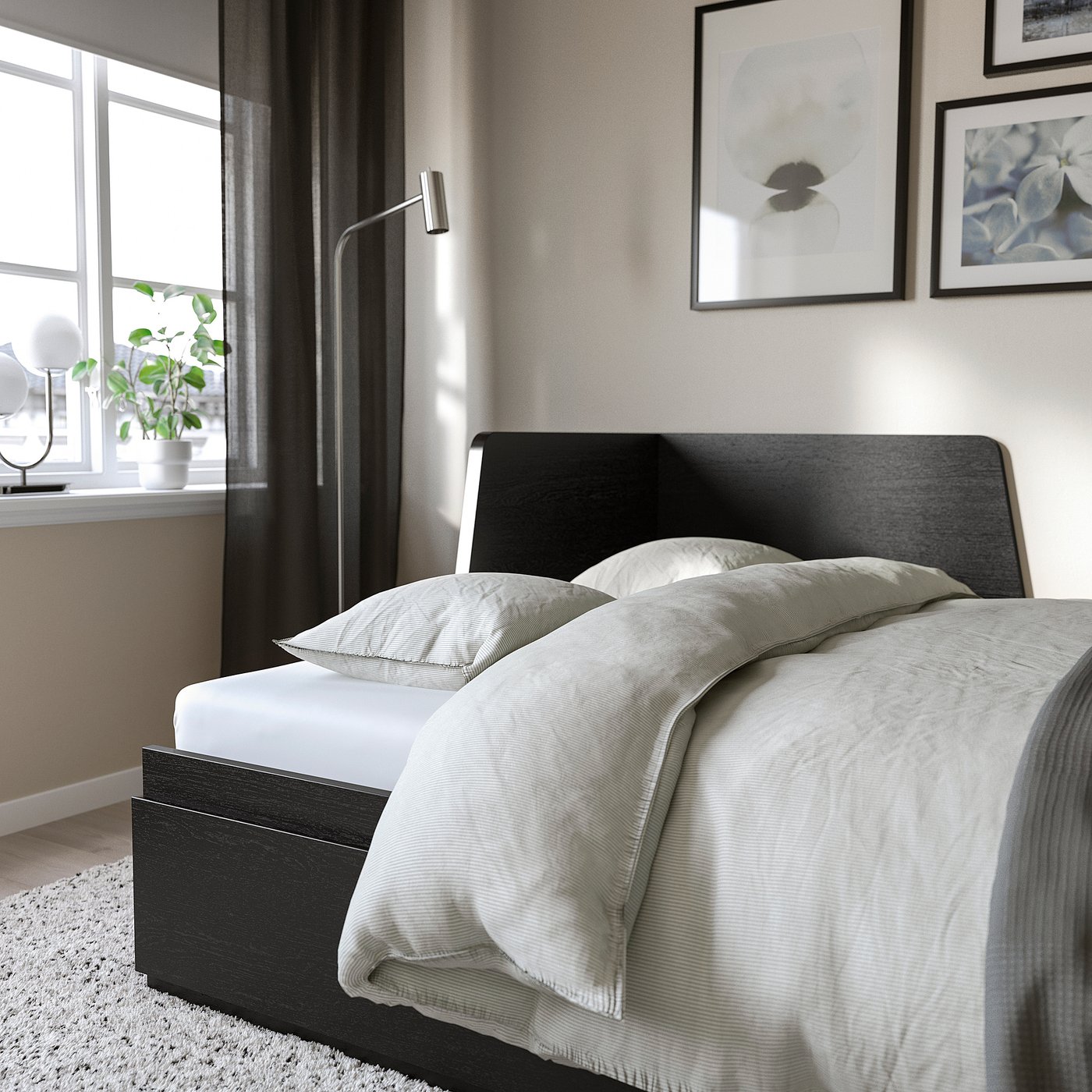 Modern bed with large drawers for storage, ideal for small spaces, easily converted from a daybed into a double bed.