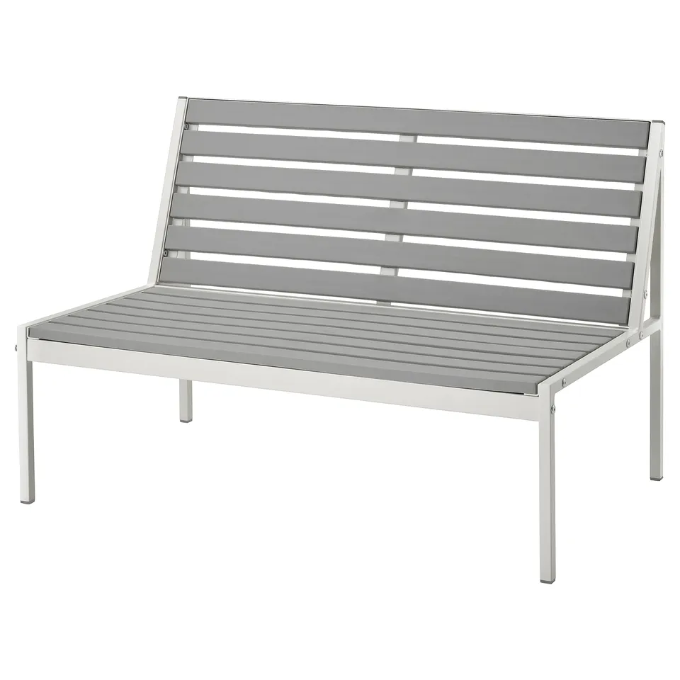 A JOLPEN outdoor sofa, grey, with a metal frame and plastic slats, designed for small spaces.