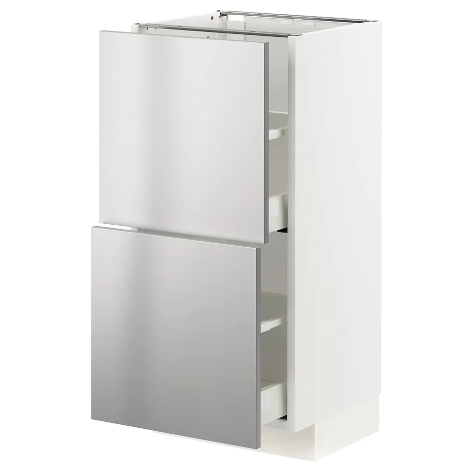 A white ikea METOD kitchen cabinet with stainless steel doors and drawers. It a sleek, modern design with a sturdy frame and self-closing drawers.