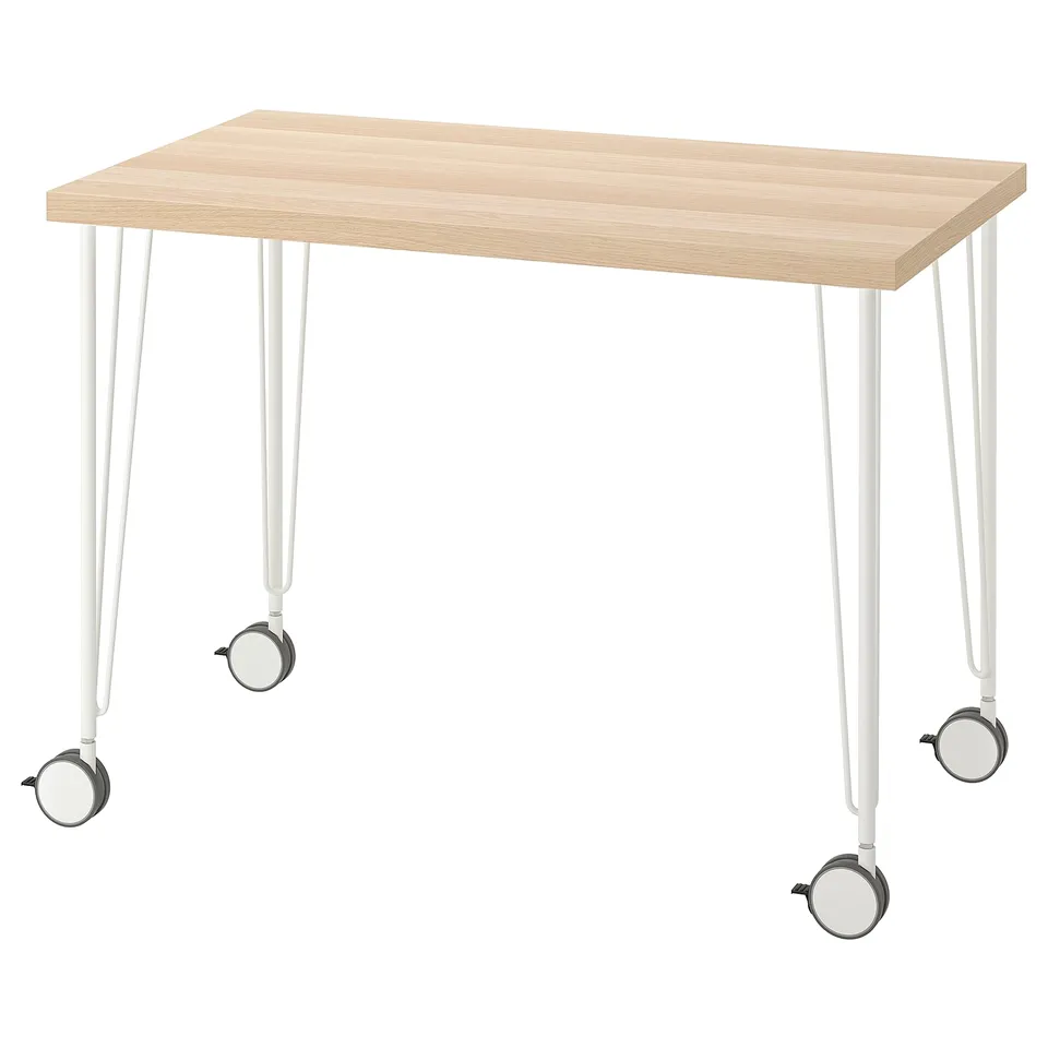 Rectangular light wood desk with white metal legs and wheels.