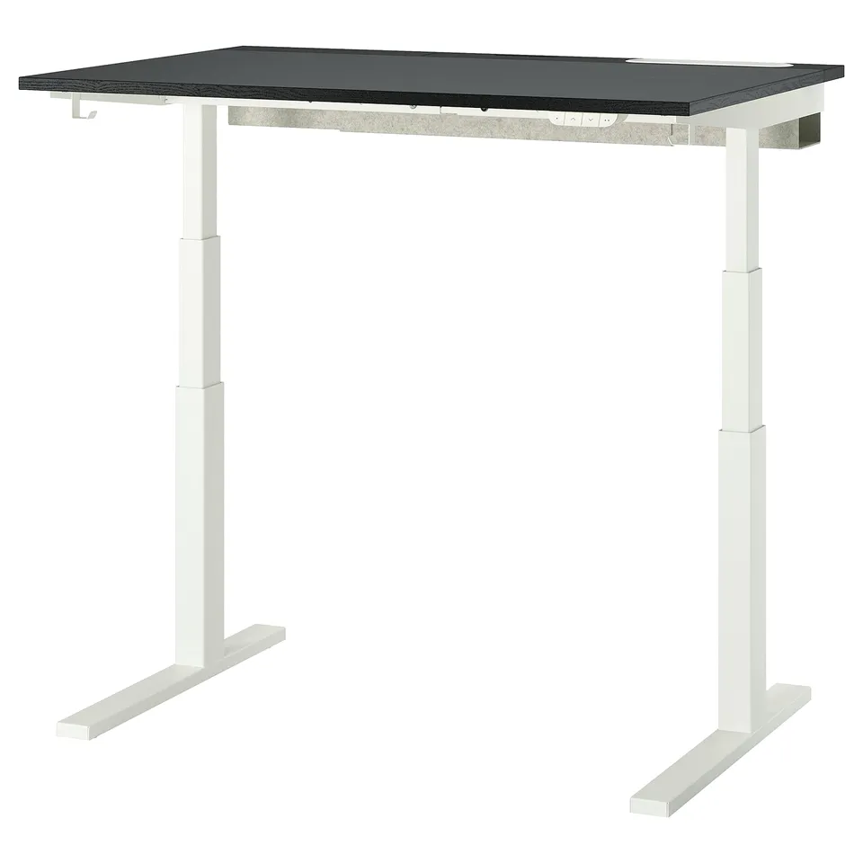 A white MITTZON adjustable height desk with a black top. Its an ergonomic sit/stand desk for enhanced comfort and productivity.