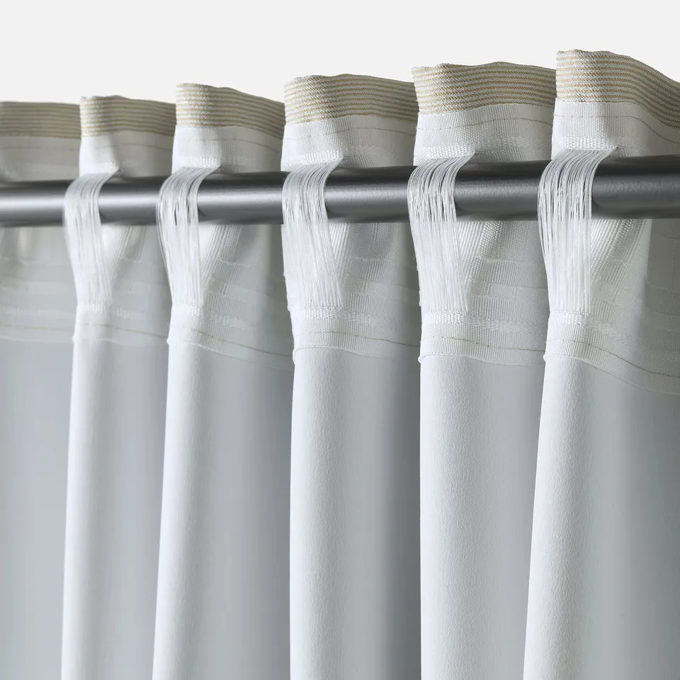 Close-up of VILBORG curtains with heading tape, ready to hang. Rod pocket detail seen.