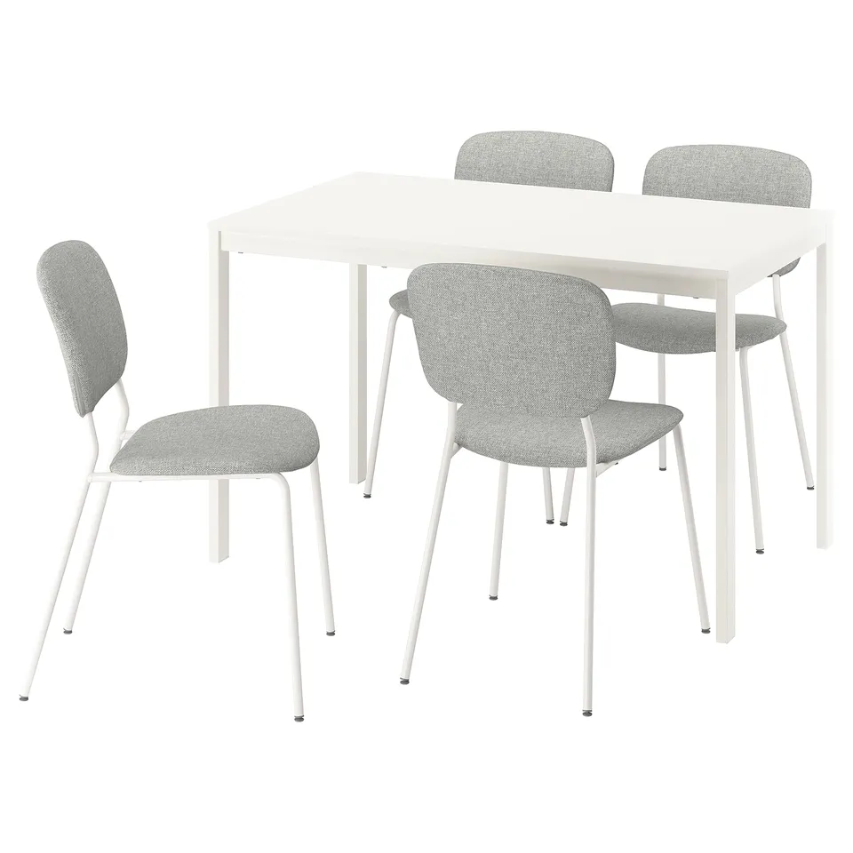 A white VIHALS dining set with four grey chairs and a rectangular table. Minimalist and modern, its made of steel and particleboard for durability.