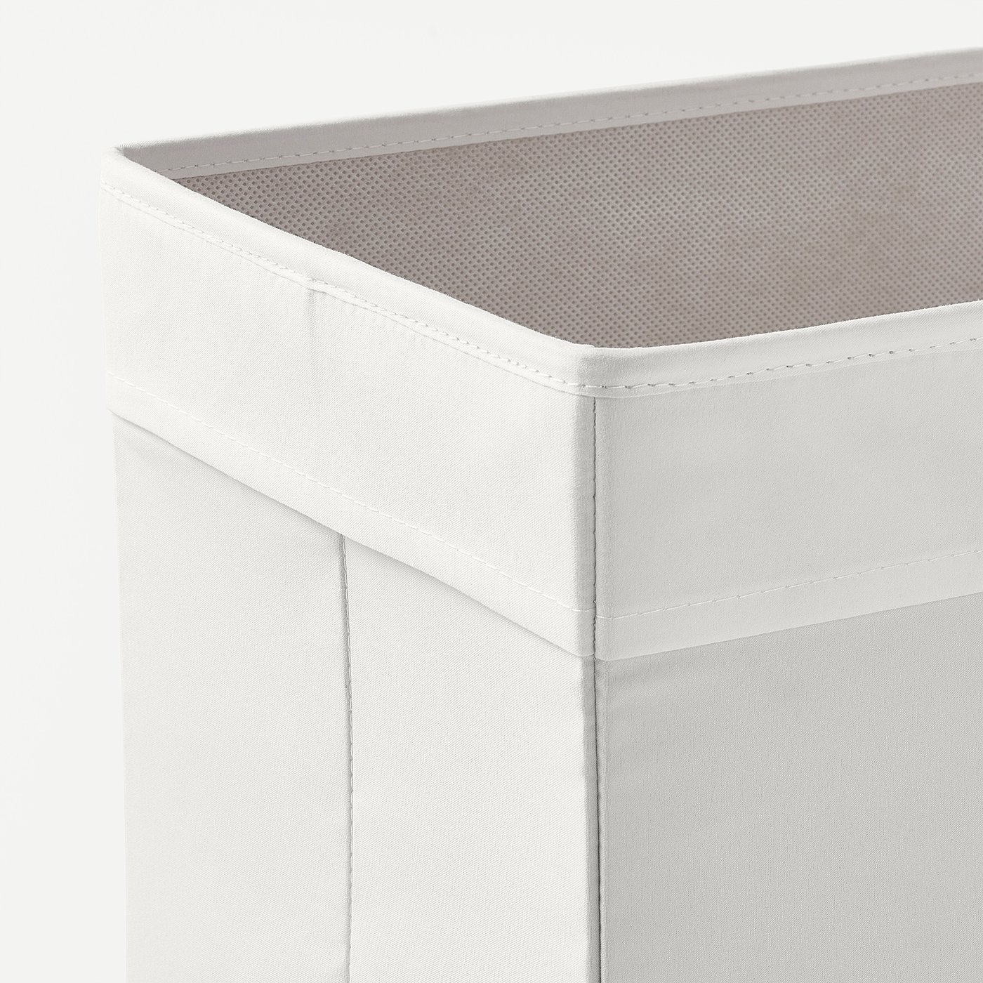 White fabric storage box with mesh top, sturdy construction, neat stitching.