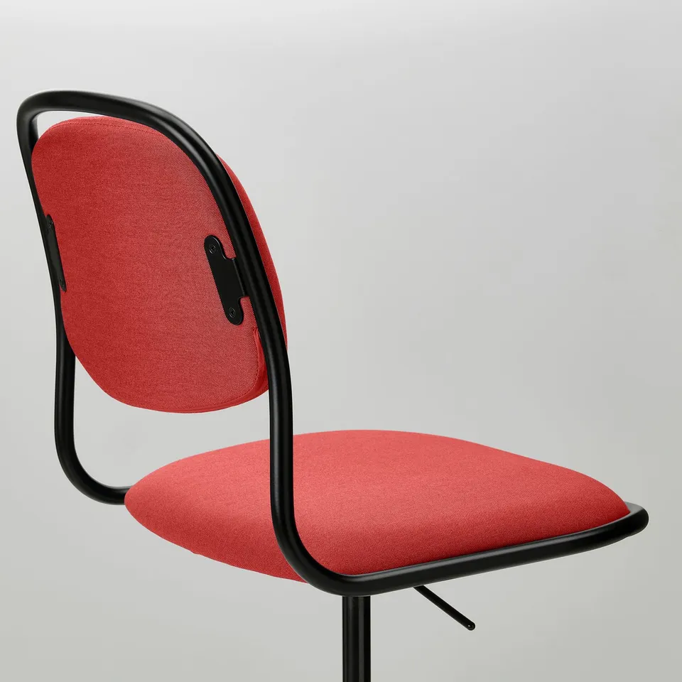Bright red office chair with black frame, offering comfort and modern design for any workspace.