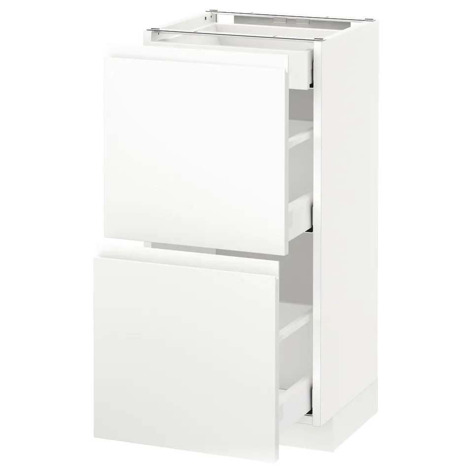 Modern white METOD kitchen cabinet with sleek design and integrated handles.